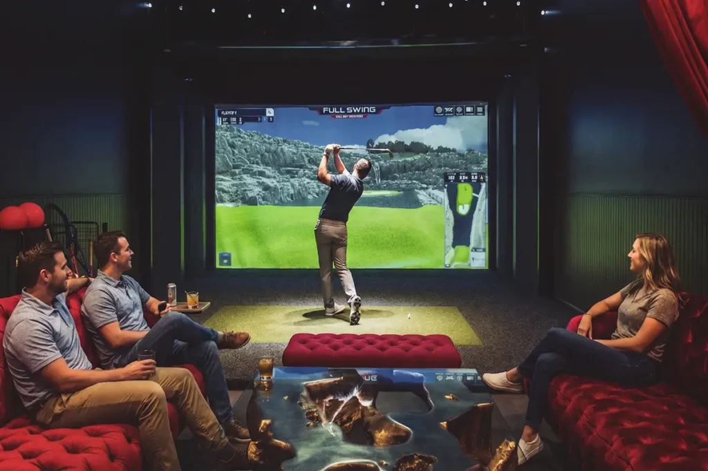 Group enjoying the golf simulator
