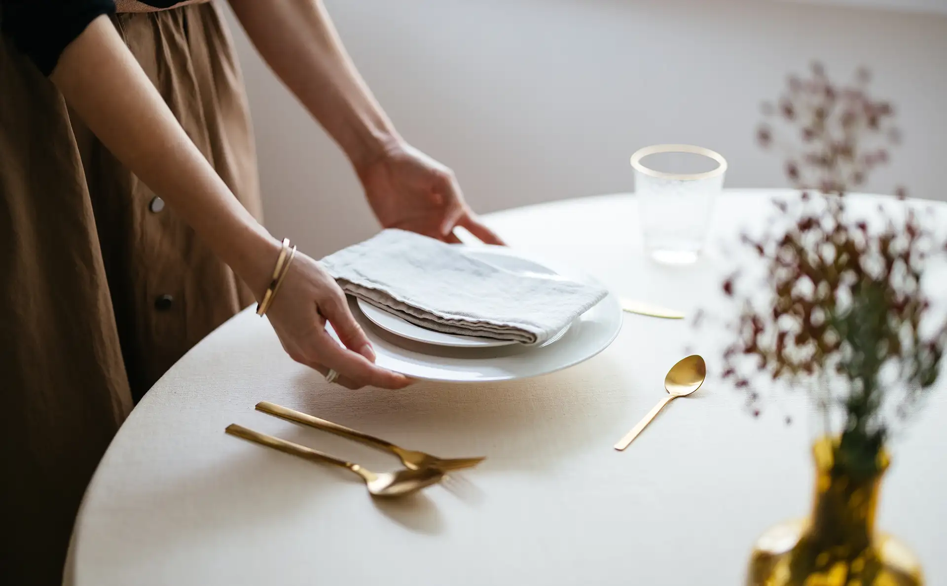 Waitress setting the table